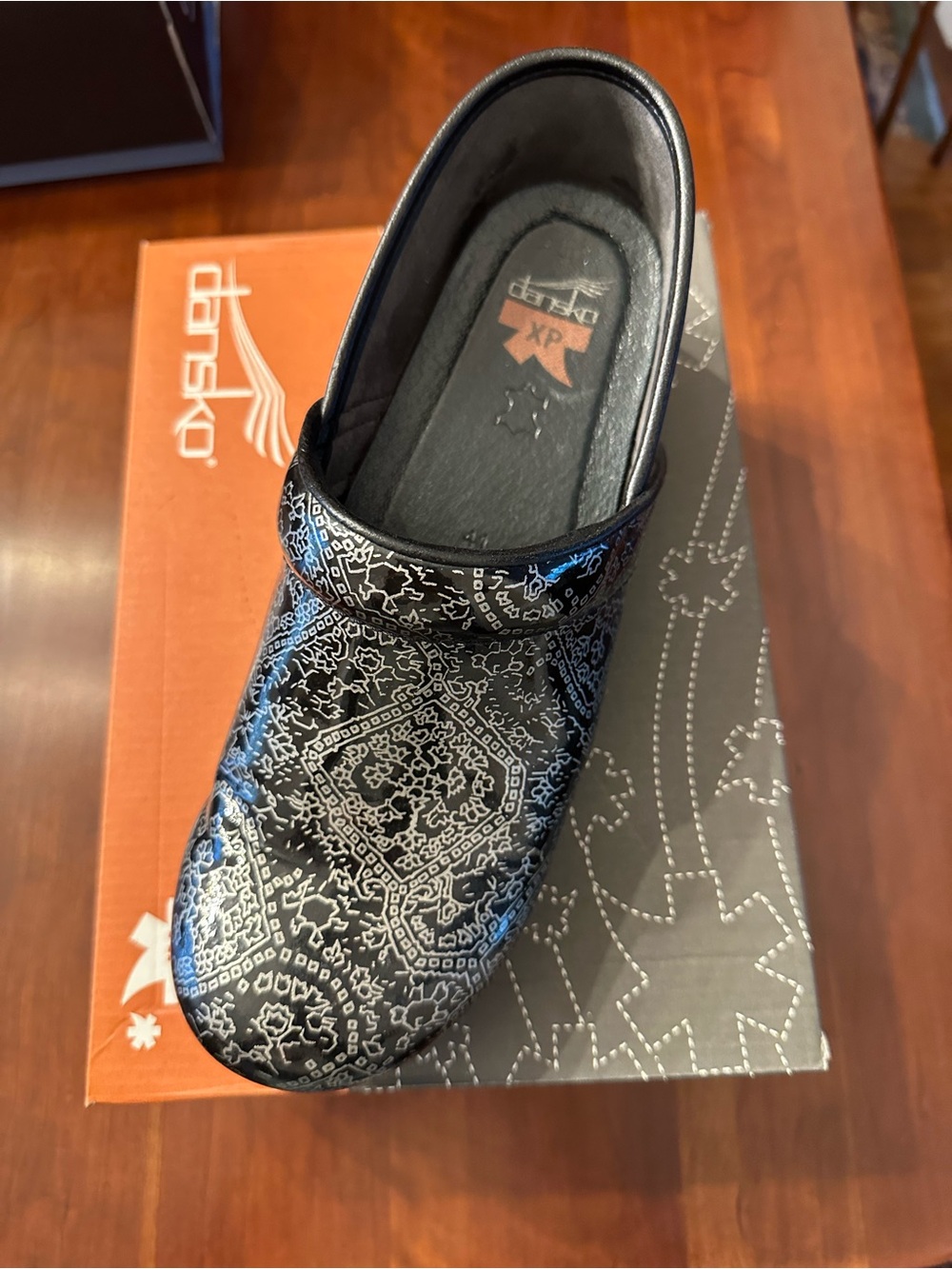 Dansko Black Paisley Patent Clog
